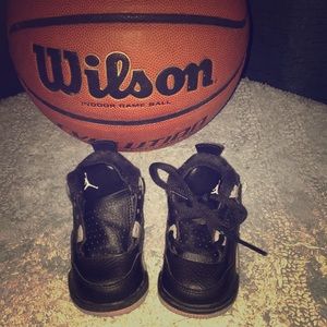 Black and grey 4c Jordan 4’s